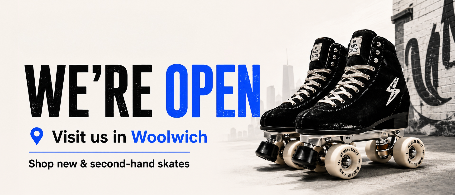 Promotional banner for a skate shop in Woolwich, featuring a pair of black quad roller skates on the right and large text on the left reading 'WE'RE OPEN Visit us in Woolwich. Shop new & second-hand skates.